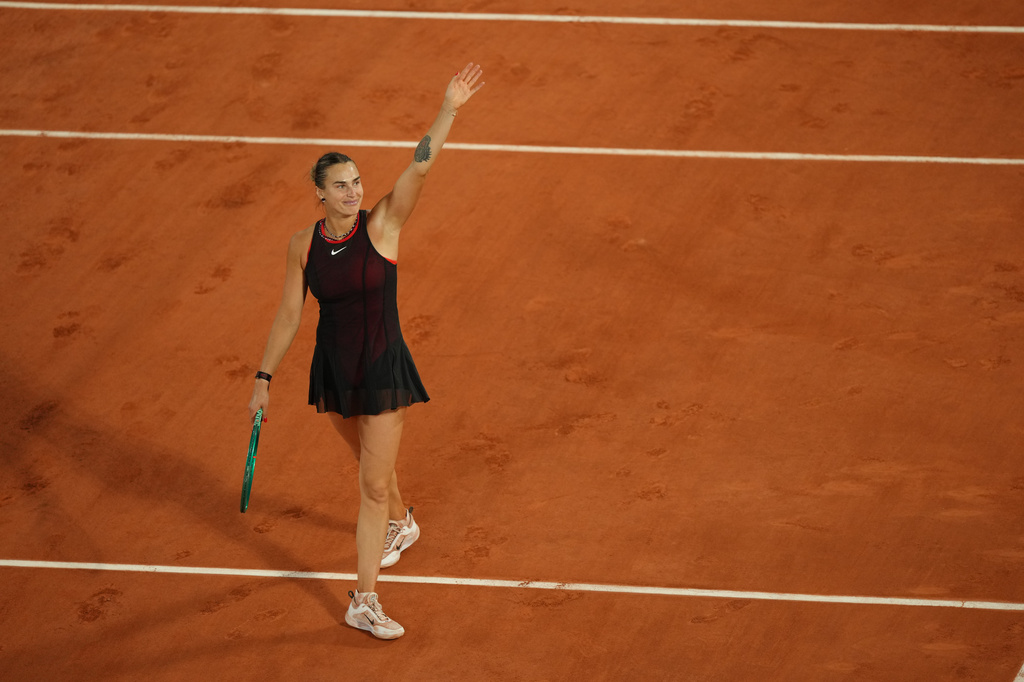 Aryna Sabalenka of Belarus reacts after winning the fourth-round tennis match against Japan's Naomi Osaka at the French Open in Paris, Monday, June 1, 2026. (AP Photo/Aurelien Morissard)