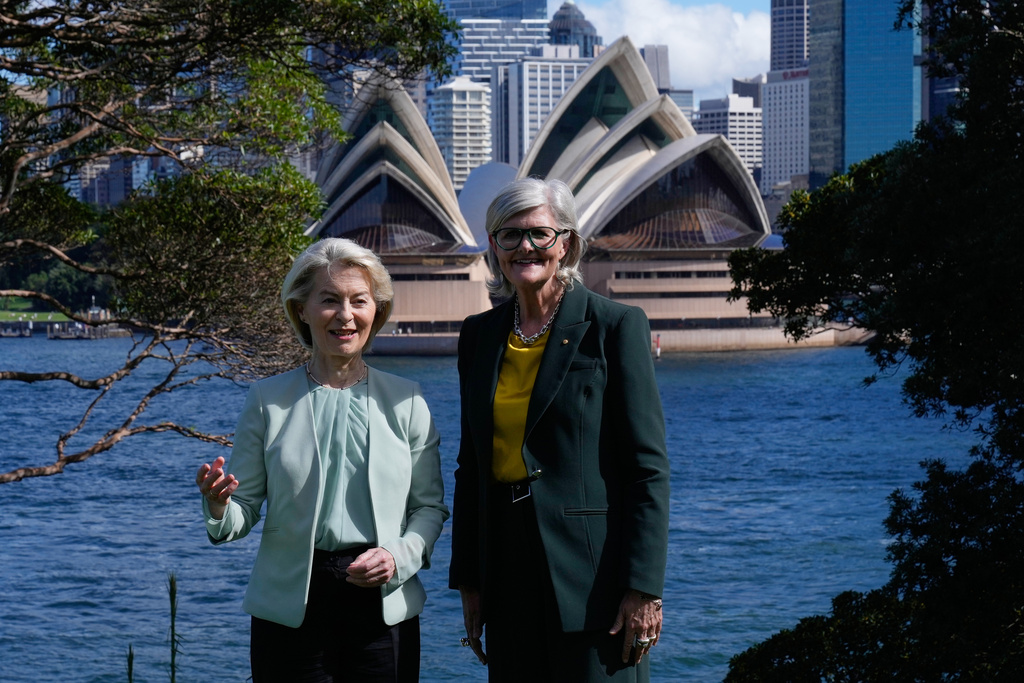 President of the European Commission, Ursula von der Leyen, left, and Governor-General of Australia, Sam Mostyn, pose for a photo at Admiralty House in Sydney, Monday, March 23, 2026. (AP Photo/Rick Rycroft)