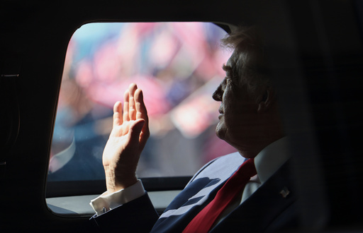 U.S. President Donald Trump waves from his official vehicle as he heads to attend the 47th Association of Southeast Asian Nations (ASEAN) summit after arriving at Kuala Lumpur International Airport in Kuala Lumpur, Malaysia, Sunday, Oct. 26, 2025. (Hasnoor Hussain/Pool Photo via AP) U.S. President Donald Trump waves from his official vehicle as he heads to attend the 47th Association of Southeast Asian Nations (ASEAN) summit after arriving at Kuala Lumpur International Airport in Kuala Lumpur, Malaysia, Sunday, Oct. 26, 2025. (Hasnoor Hussain/Pool Photo via AP)