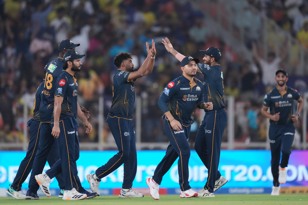 Gujarat Titans' Mohammed Siraj celebrate with teammates the wicket of Chennai Super Kings' Sanju Samson during the Indian Premier League cricket match between Gujarat Titans and Chennai Super Kings in Ahmedabad, India, Thursday, May 21, 2026.(AP Photo/Ajit Solanki)