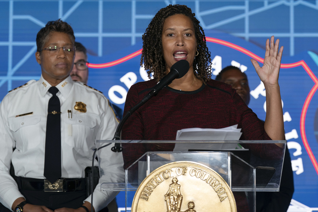District of Columbia Mayor Muriel Bowser flanked by Pamela Smith, Chief of Police of the Metropolitan Police Department speaks during a news conference at Metropolitan Police Department Headquarters in Washington, Wednesday, Sept. 3, 2025. (AP Photo/Jose Luis Magana)