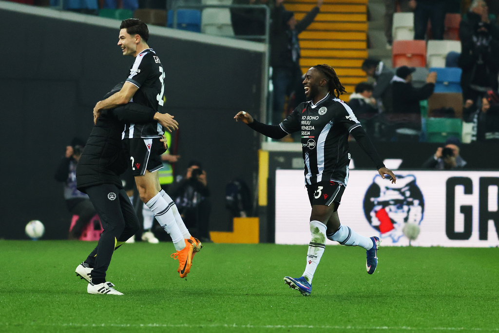 Udinese's Jurgen Ekkelenkamp, top left, celebrates after scoring the 1-0 goal for his team during the Serie A soccer match between Udinese and Roma, in Udine, Italy, Monday, Feb. 2, 2026. (Andrea Bressanutti/LaPresse via AP)