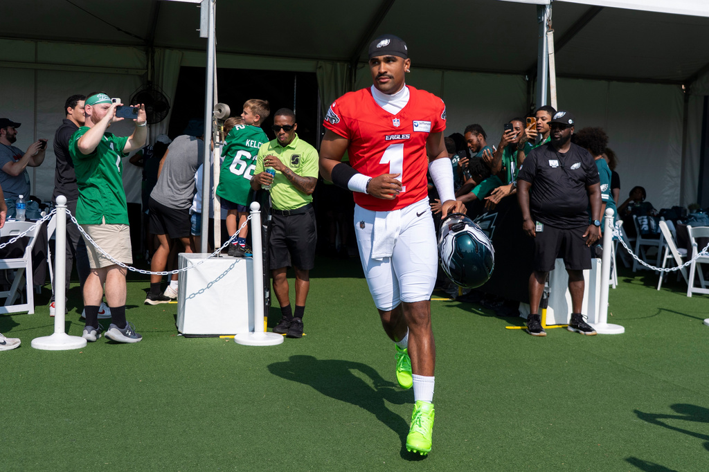 Philadelphia Eagles quarterback Jalen Hurts (1) takes to the field during practice at the team's NFL football training camp in Philadelphia, Wednesday, July 29, 2026. (AP Photo/Chris Szagola)