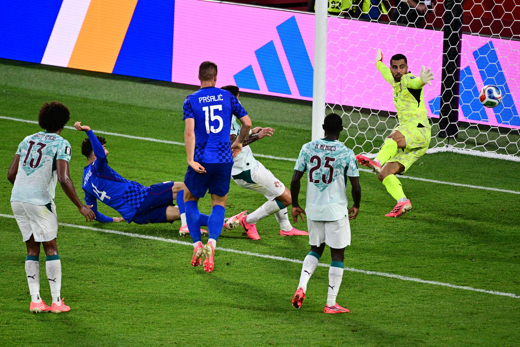 Croatia's Josko Gvardiol (4) scores a goal against Portugal goalkeeper Diego Costa (1) that was later taken back due to an offside call, during the second half of a World Cup round of 32 soccer match, in Toronto on Thursday, July 2, 2026. (Sammy Kogan/The Canadian Press via AP)