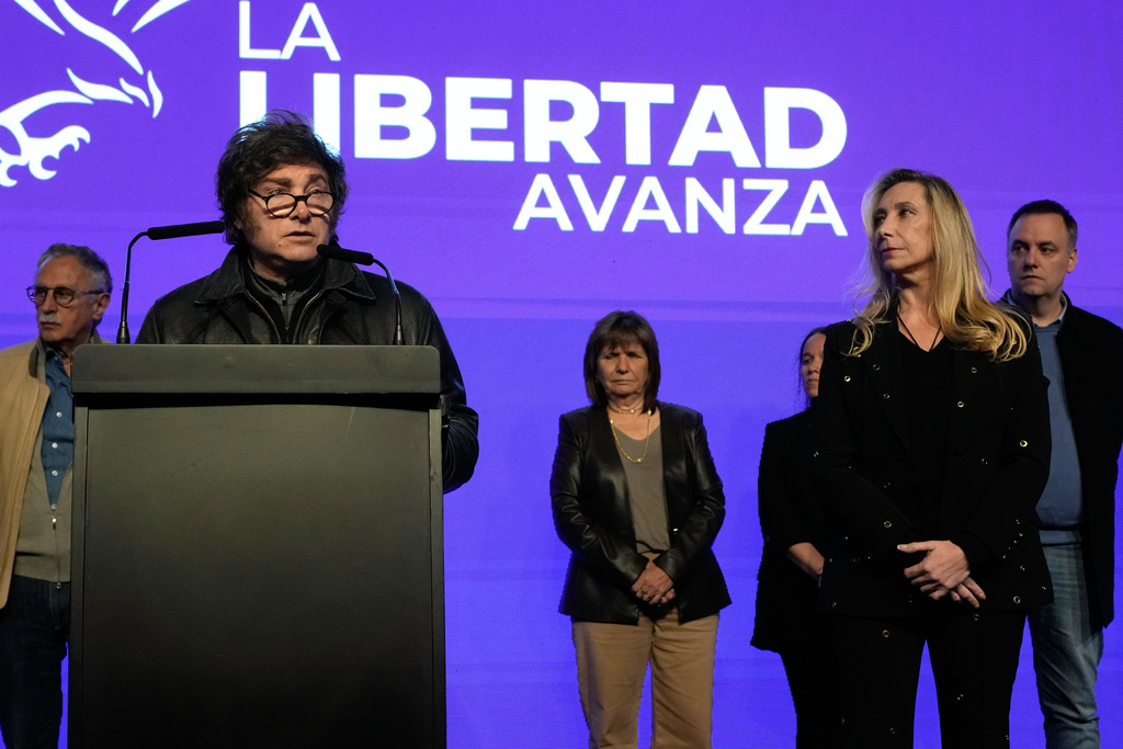 President Javier Milei, left, and his sister, General Secretary of the Presidency Karina Milei, front right, appear after legislative provincial election polls closed in La Plata, Argentina, Sunday, Sept. 7, 2025. (AP Photo/Gustavo Garello)
