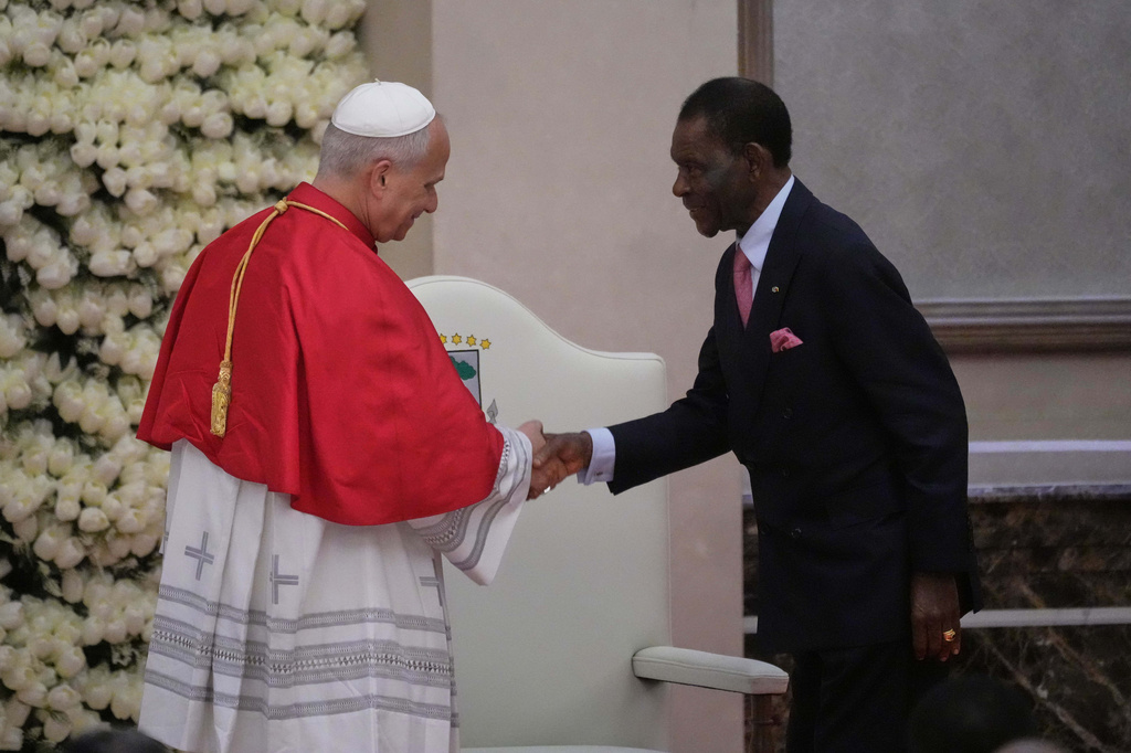 Pope Leo XIV shakes hands with Equatorial Guinea's President Teodoro Obiang Nguema Mbasogo as he meets with the authorities, civil society and the diplomatic corps in Malabo, Equatorial Guinea, Tuesday, April 21, 2026, on the ninth day of his 11-day pastoral visit to Africa. (AP Photo/Andrew Medichini)