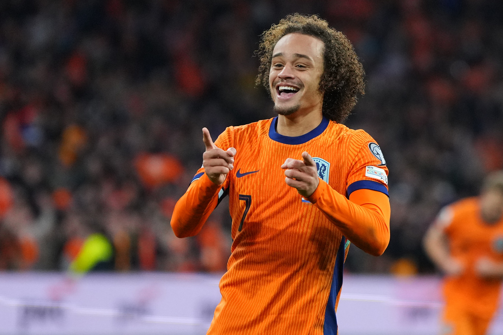 Netherlands' Xavi Simons celebrates scoring his side's 3rd goal during a World Cup 2026 group G qualifying soccer match between Netherlands and Lithuania in Amsterdam, Netherlands, Monday, Nov. 17, 2025. (AP Photo/Peter Dejong)
