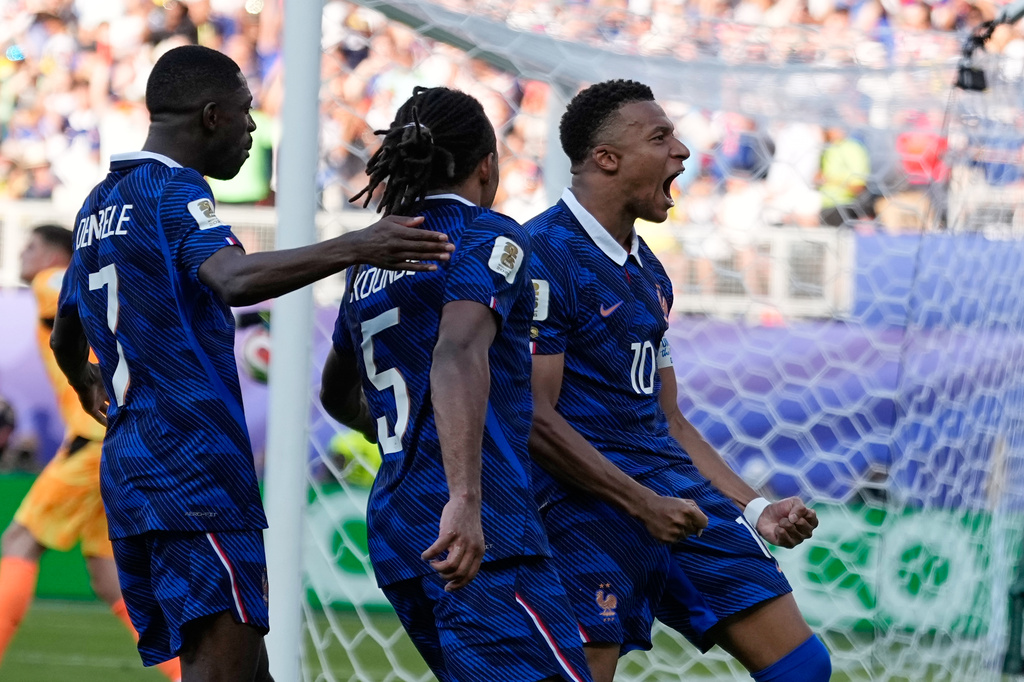 France's Kylian Mbappe celebrates after scoring from the penalty spot the opening goal during the World Cup round of 16 soccer match between Paraguay and France in Philadelphia, Saturday, July 4, 2026. (AP Photo/Matt Slocum)