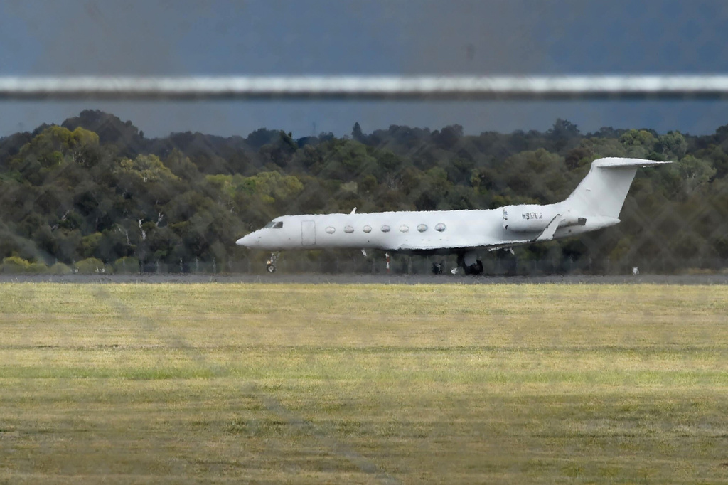 A jet carrying passengers from the hantavirus-stricken cruise ship MV Hondius arrives at RAAF Base Pearce in Perth, Australia, from the Netherlands on Friday, May 15, 2026. (Aaron Bunch/AAP Image via AP)