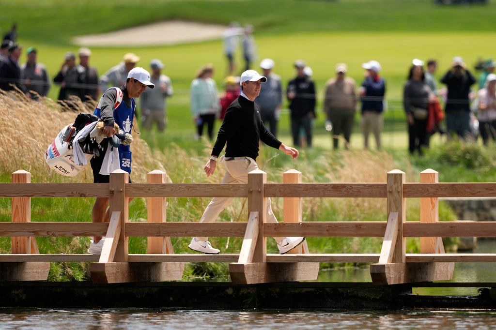 Rory McIlroy, of Northern Ireland, walks to green on the eighth hole during the first round of the PGA Championship golf tournament practice round at Aronimink Golf Club, Thursday, May 14, 2026, in Newtown Square, PA. (AP Photo/Carolyn Kaster)