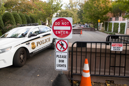 FILE - An officer with the Uniform Division of the United States Secret Service sits in his car at a checkpoint near the home of President Barack Obama, Oct. 24, 2018, in Washington. (AP Photo/Alex Brandon, File) FILE - An officer with the Uniform Division of the United States Secret Service sits in his car at a checkpoint near the home of President Barack Obama, Oct. 24, 2018, in Washington. (AP Photo/Alex Brandon, File)