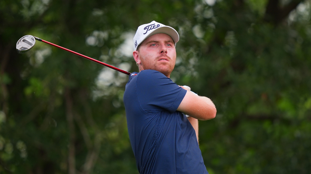 Ryan Gerard watches his tee shot on the ninth hole during the first round of the Charles Schwab Challenge golf tournament at Colonial Country Club in Fort Worth, Texas, Thursday, May 28, 2026. (AP Photo/LM Otero)