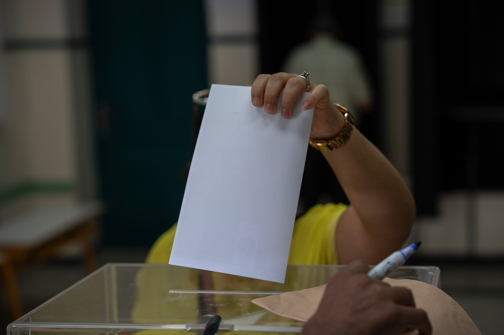 A woman casts her vote inside a polling station during the legislative elections in Rabat, Morocco, Wednesday, Sept. 23, 2026. (AP Photo/Mosa'ab Elshamy)