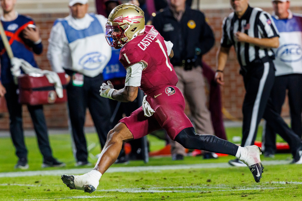 Florida State quarterback Tommy Castellanos (1) runs for a touchdown during the second half of an NCAA college football game against Virginia Tech, Saturday, Nov. 15, 2025, in Tallahassee, Fla. (AP Photo/Colin Hackley)
