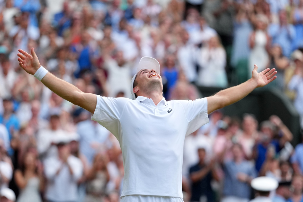 Arthur Fery of Britain celebrates winning the men's singles fourth round match against Grigor Dimitrov of Bulgaria at the Wimbledon Tennis Championships in London, Monday, July 6, 2026.(AP Photo/Kirsty Wigglesworth)