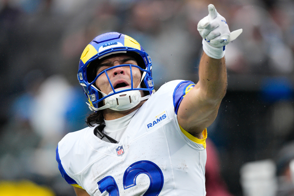 Los Angeles Rams wide receiver Puka Nacua celebrates after a catch against the Carolina Panthers during the second half of an NFL football game, Sunday, Nov. 30, 2025, in Charlotte, N.C. (AP Photo/Jacob Kupferman)