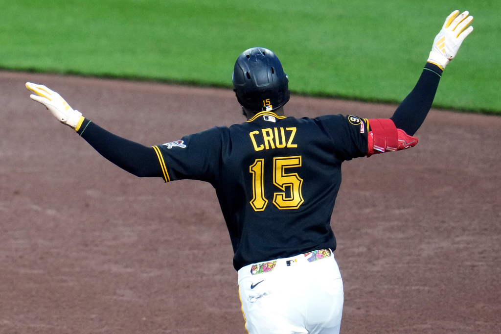Pittsburgh Pirates' Oneil Cruz celebrates as he rounds the bases after hitting a solo home run off pitcher Kyle Leahy during the sixth inning of a baseball game in Pittsburgh, Thursday, April 28, 2026. (AP Photo/Gene J. Puskar)