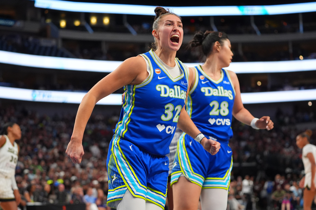 Dallas Wings forward Jessica Shepard (32) reacts after scoring during the second half of a WNBA basketball game against the Chicago Sky in Dallas, Sunday, July 12, 2026. (AP Photo/LM Otero)