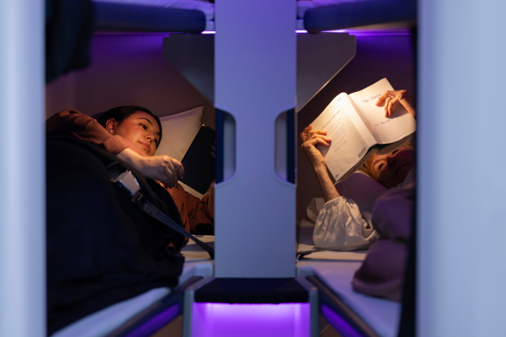 This photo provided by Air New Zealand shows sleeping pods in a mock-up of a plane cabin in Auckland, New Zealand. (Air New Zealand via AP)