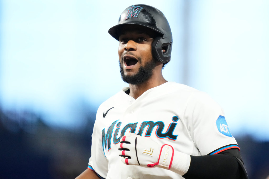Miami Marlins' Otto Lopez reacts after hitting a single during the third inning of a baseball game against the Seattle Mariners, Wednesday, July 8, 2026, in Miami. (AP Photo/Lynne Sladky)