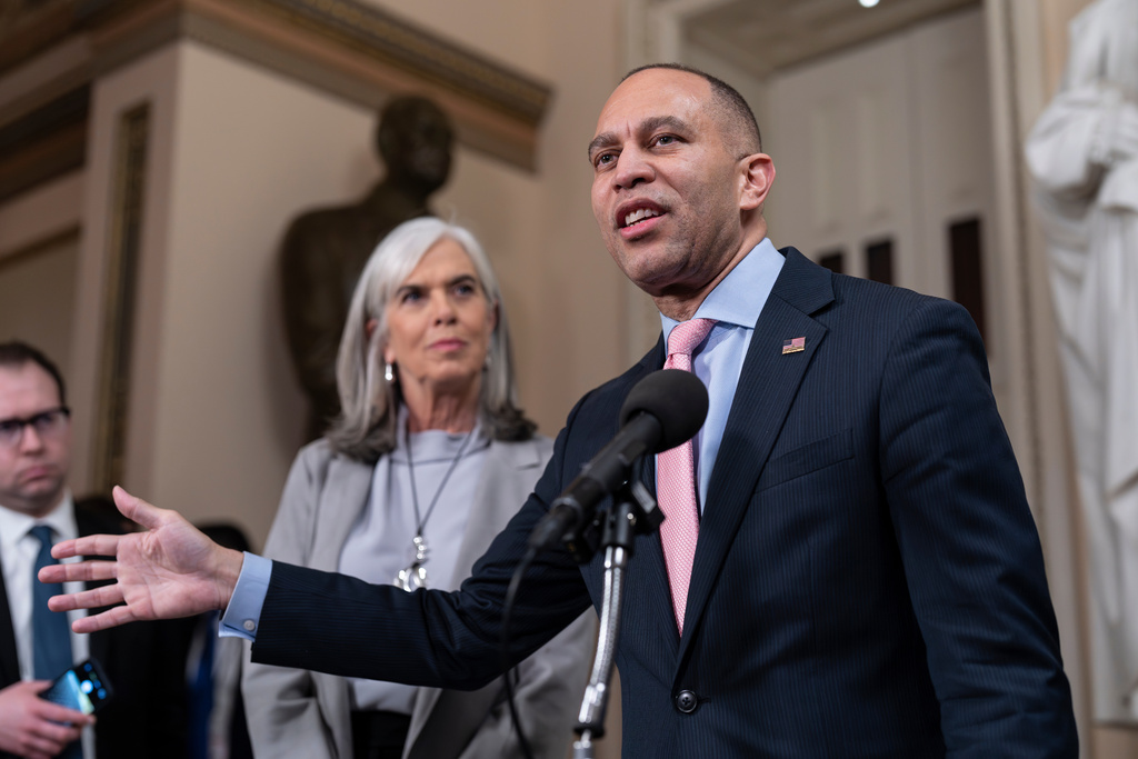 House Minority Leader Hakeem Jeffries, D-N.Y., joined by Rep. Katherine Clark, D-Mass., left, speaks to reporters just after the House passed legislation that extends expired health care subsidies for those who get coverage through the Affordable Care Act, at the Capitol in Washington, Thursday, Jan. 8, 2026. (AP Photo/J. Scott Applewhite)