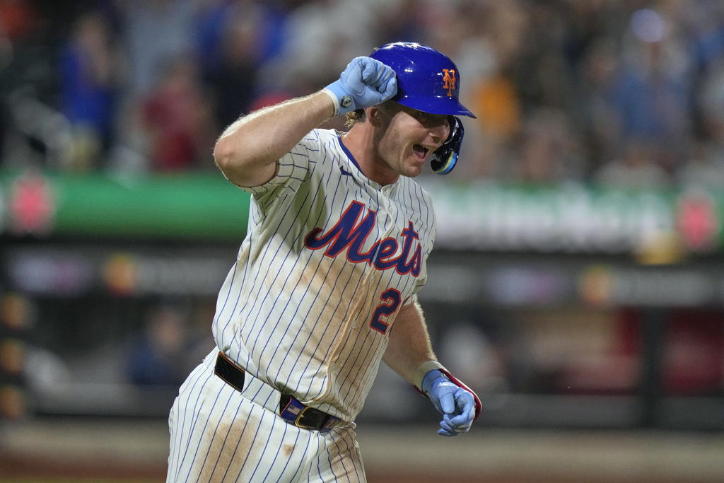 New York Mets' Pete Alonso celebrates as he runs the bases after hitting a home run during the sixth inning of a baseball game against the Atlanta Braves Tuesday, Aug. 12, 2025, in New York. (AP Photo/Frank Franklin II)