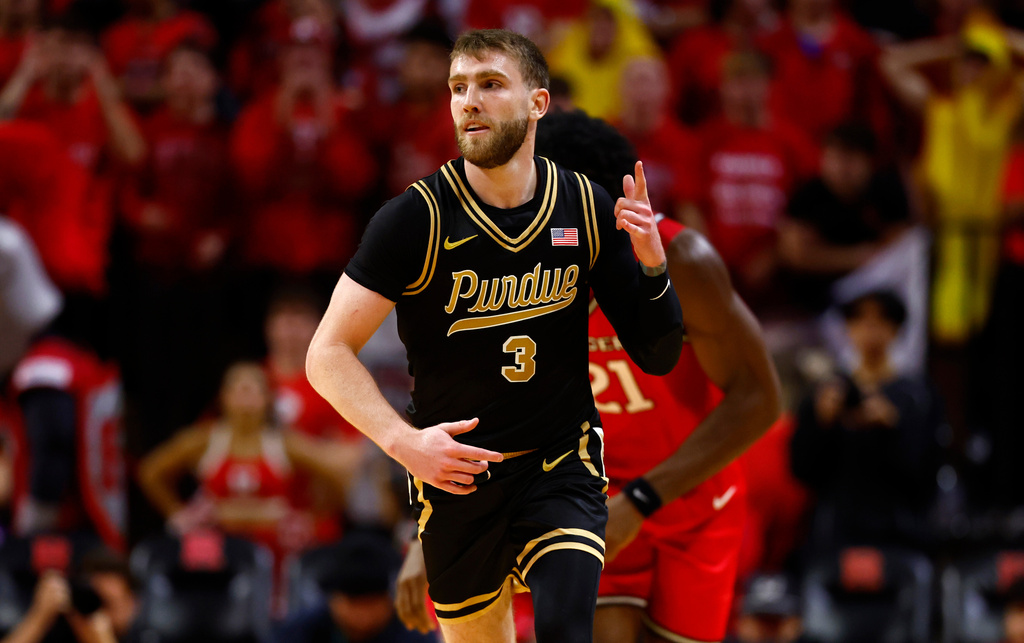 Purdue guard Braden Smith (3) reacts after scoring against Rutgers during the second half of an NCAA college basketball game, Tuesday, Dec. 2, 2025, in Piscataway, N.J. (AP Photo/Noah K. Murray)