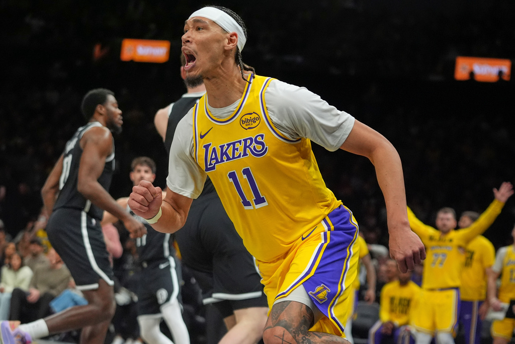 Los Angeles Lakers' Jaxson Hayes (11) celebrates after dunking during the first half of an NBA basketball game against the Brooklyn Nets Tuesday, Feb. 3, 2026, in New York. (AP Photo/Frank Franklin II)