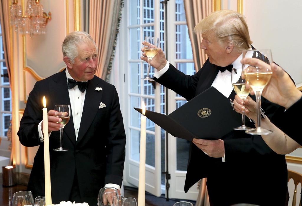 FILE - U.S. President Donald Trump and Britain's Prince Charles toast, during the Return Dinner in Winfield House, the residence of the Ambassador of the United States of America to the UK, in Regent's Park, part of the president's state visit to the UK, in London, Tuesday, June 4, 2019. (Chris Jackson/Pool Photo via AP, File)