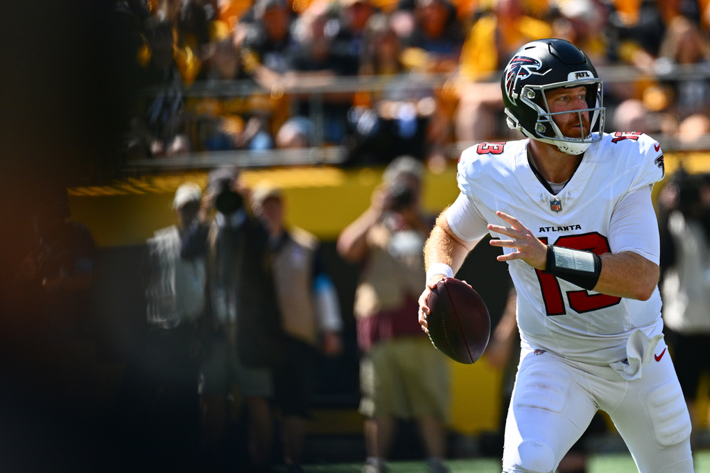 Atlanta Falcons quarterback Cooper Rush (13) looks to pass during an NFL football game against the Pittsburgh Steelers, Sunday, Sept. 13, 2026, in Pittsburgh. (AP Photo/Justin Berl)