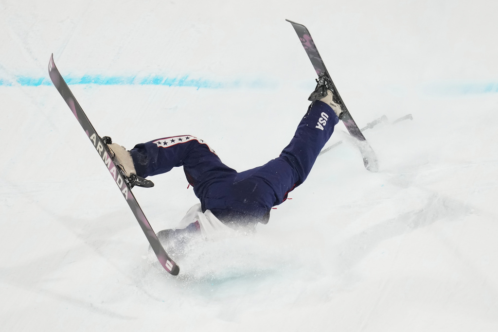 United States' Rell Harwood falls as she competes in the women's freestyle skiing big air qualifications at the 2026 Winter Olympics, in Livigno, Italy, Saturday, Feb. 14, 2026. (AP Photo/Abbie Parr)