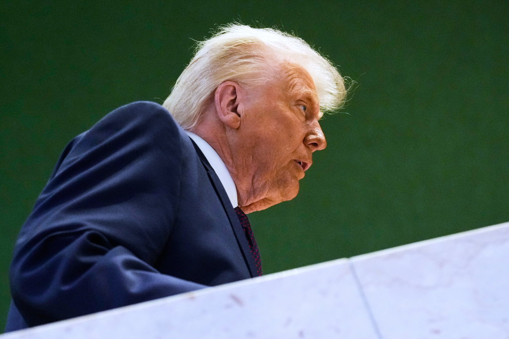 US President Donald Trump leaves after a signing ceremony of his Board of Peace initiative at the Annual Meeting of the World Economic Forum in Davos, Switzerland, Thursday, Jan. 22, 2026. (AP Photo/Markus Schreiber)