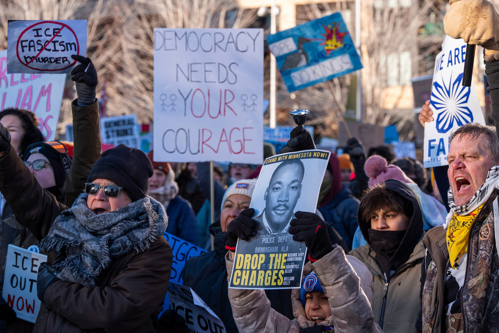 People gather in The Commons after a protest march, Friday, Jan. 30, 2026, in Minneapolis. (AP Photo/Alex Brandon)