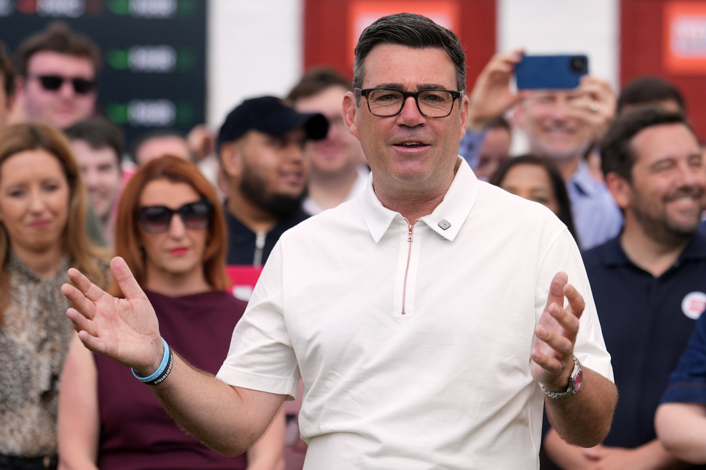 Britain's Labour party candidate Andy Burnham speaks to supporters after the Makerfield by-election in Ashton in Makerfield, England, Friday, June 19, 2026.(AP Photo/Jon Super)