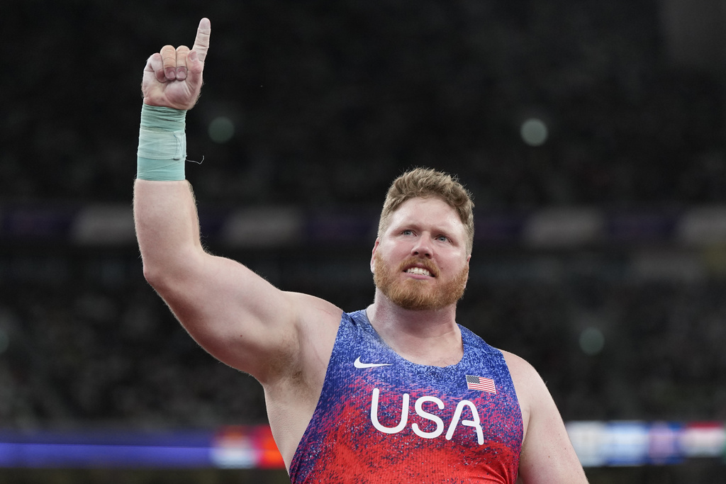 United States' Ryan Crouser reacts as he competes in the men's shot put final at the World Athletics Championships in Tokyo, Saturday, Sept. 13, 2025. (AP Photo/Ashley Landis)