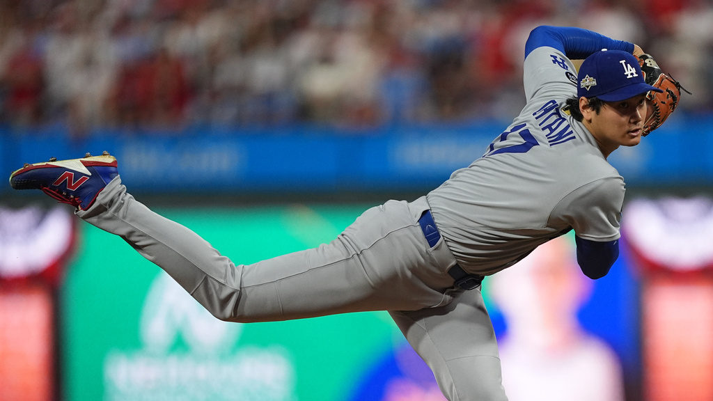 Los Angeles Dodgers' Shohei Ohtani pitches during the first inning in Game 1 of baseball's National League Division Series, Saturday, Oct. 4, 2025, in Philadelphia. (AP Photo/Matt Rourke)