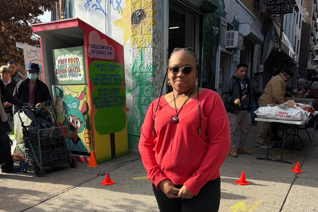 Georgina Edmonds stands outside of Collective Focus Resource Hub, a mutual aid group in Brooklyn, New York, Nov. 18, 2025. (AP Photo/Thalia Beaty)