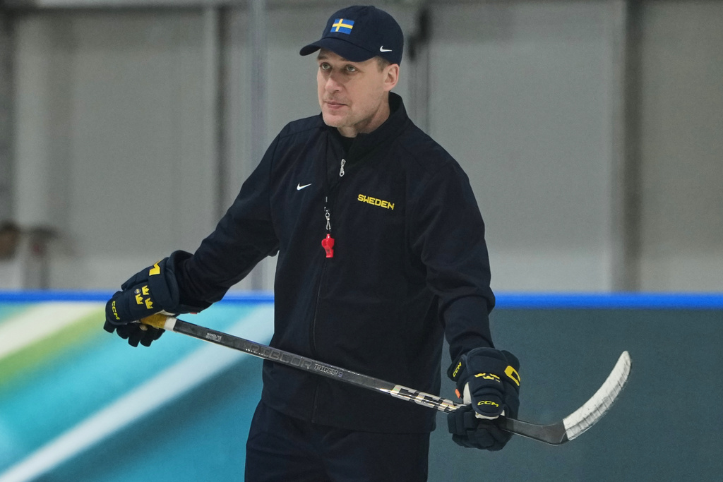 Sweden's head coach Sam Hallam skates during men's ice hockey practice at the 2026 Winter Olympics, in Milan, Italy, Sunday, Feb. 8, 2026. (AP Photo/Carolyn Kaster)