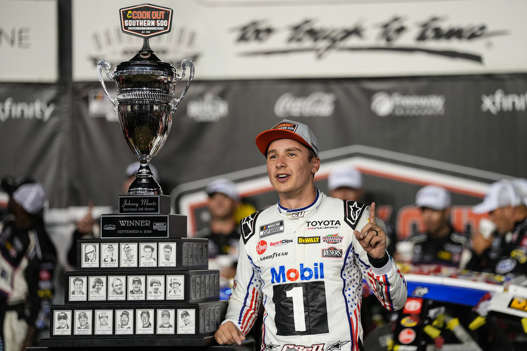Christopher Bell celebrates in Victory Lane after winning a NASCAR Cup Series auto race Sunday, Sept. 6, 2026, in Darlington, S.C. (AP Photo/Matt Kelley)