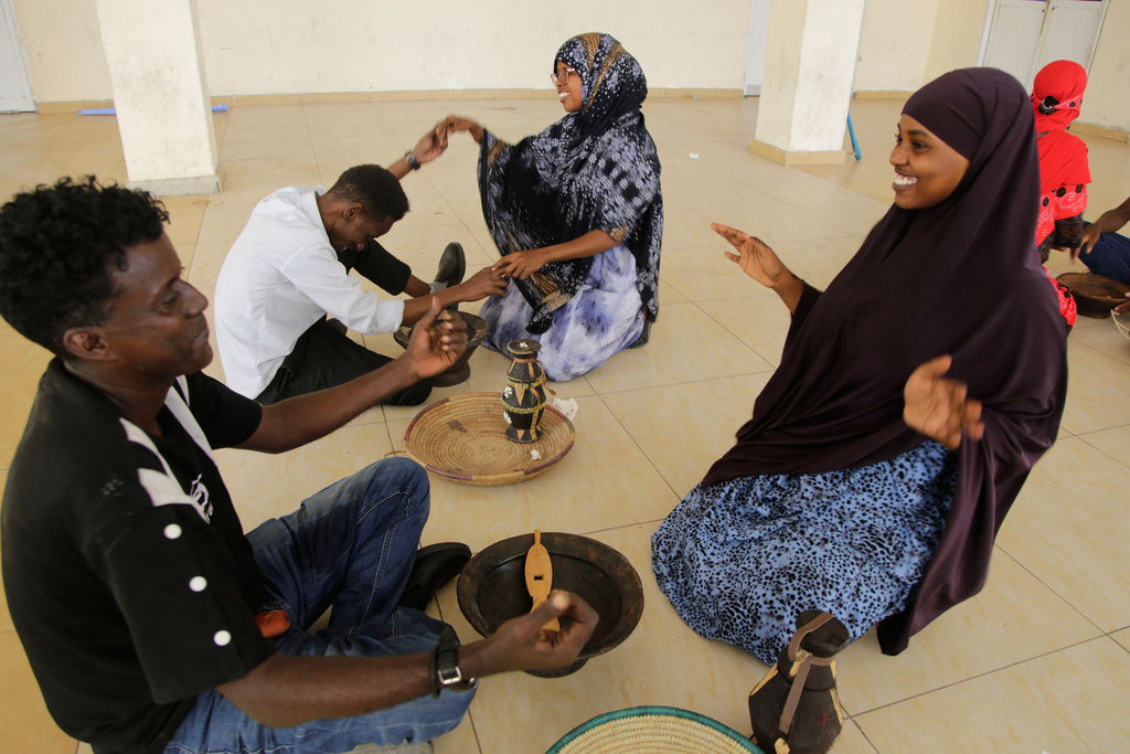 Somali poets perform during a cultural event, in Mogadishu, Somalia, Tuesday, Nov. 11, 2025. (AP Photo/Farah Abdi Warsameh)