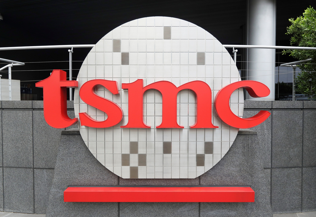 FILE - A Taiwan Semiconductor Manufacturing Co., Ltd. (TSMC) logo is seen at the headquarters in Hsinchu, Taiwan, Oct. 20, 2021. (AP Photo/Chiang Ying-ying, File)