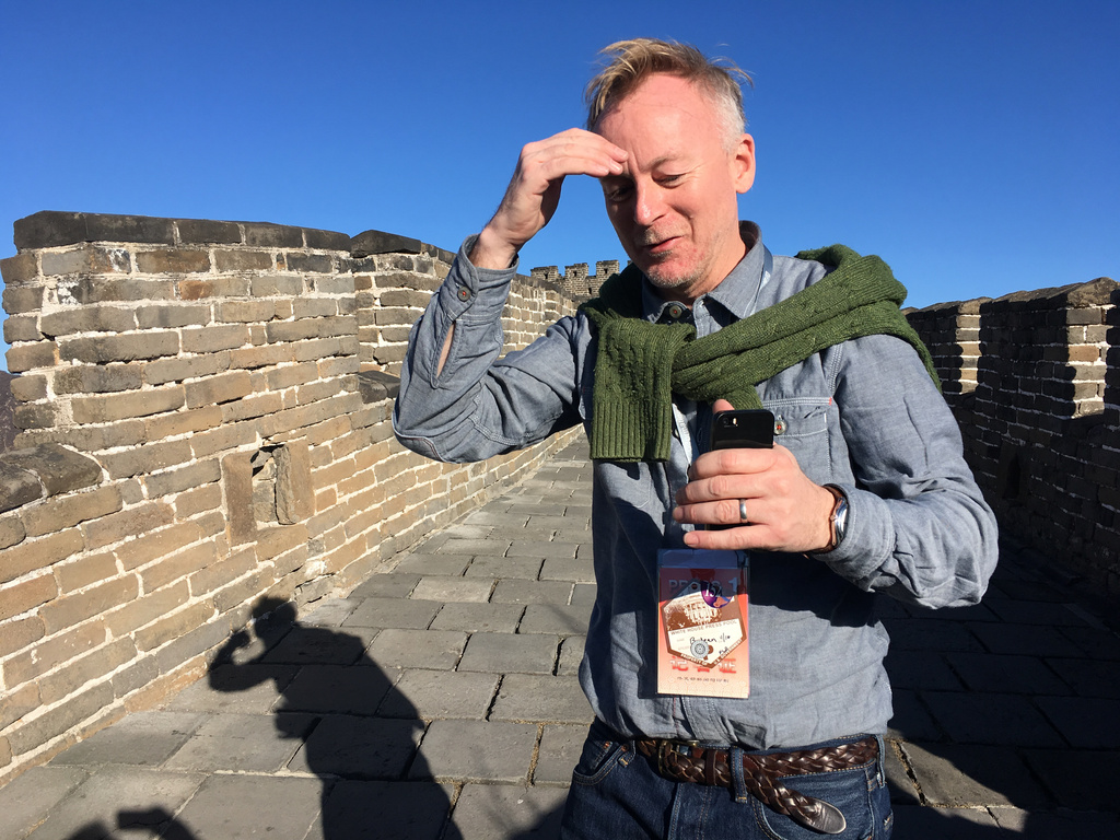 AP reporter Christopher Bodeen walks along the Mutianyu Great Wall section on the outskirts of Beijing, on Nov. 10, 2017, while covering Melania Trump’s visit to the wall. (AP Photo/Emily Wang)