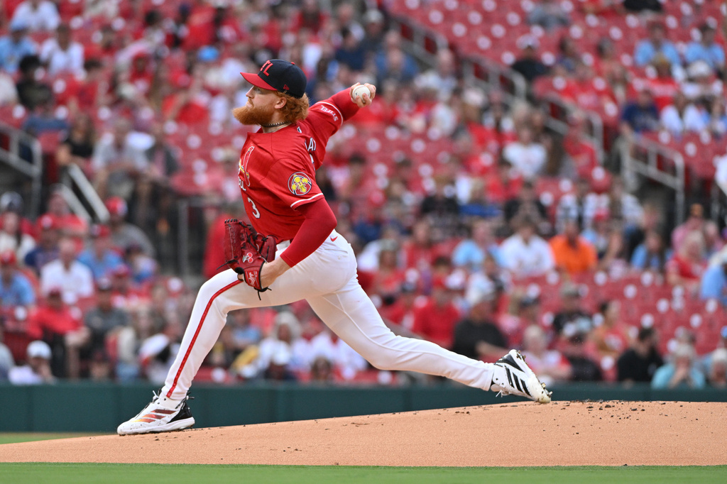 St. Louis Cardinals pitcher Dustin May delivers against the Cincinnati Reds during the first inning of a baseball game, Friday, July 24, 2026, in St. Louis. (AP Photo/Jeff Le)