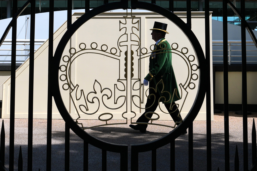 Racegoers arrive on the first day of the Royal Ascot horse race meeting in Ascot, England, Tuesday, June 16, 2026.(AP Photo/Kin Cheung)