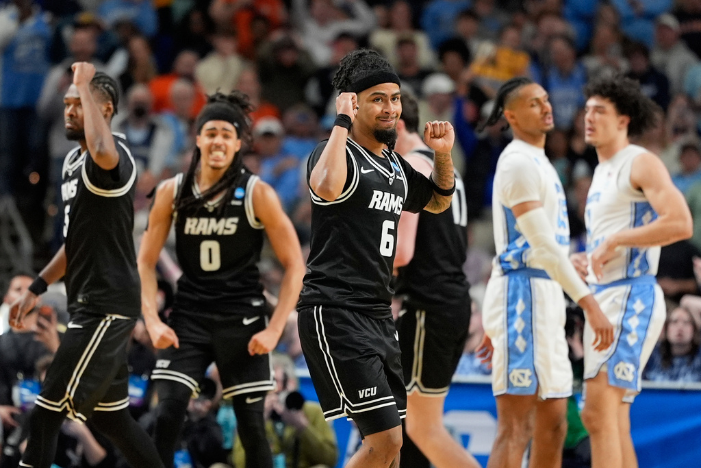 VCU guard Terrence Hill Jr. celebrates after scoring in overtime against North Carolina in the first round of the NCAA college basketball tournament, Thursday, March 19, 2026, in Greenville, S.C. (AP Photo/Chris Carlson)
