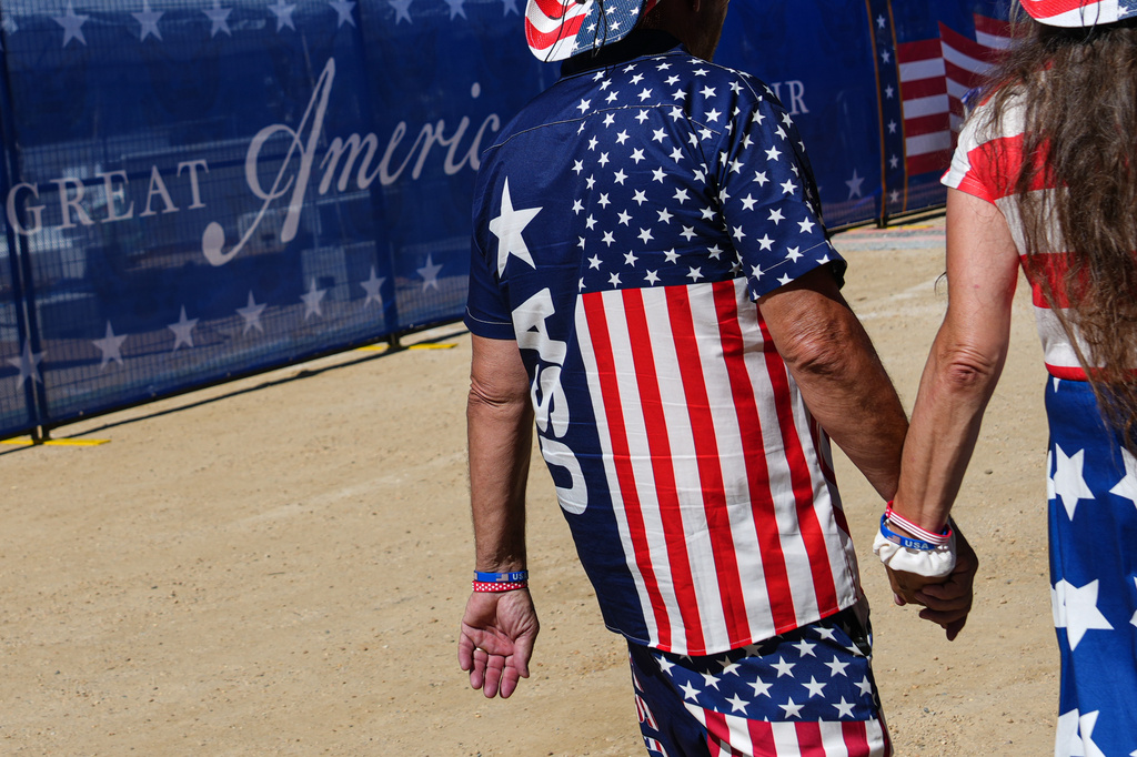 People arrive ahead of President Donald Trump's speech at the opening of the Great American State Fair on the National Mall, Wednesday, June 24, 2026, in Washington. (AP Photo/Julia Demaree Nikhinson)