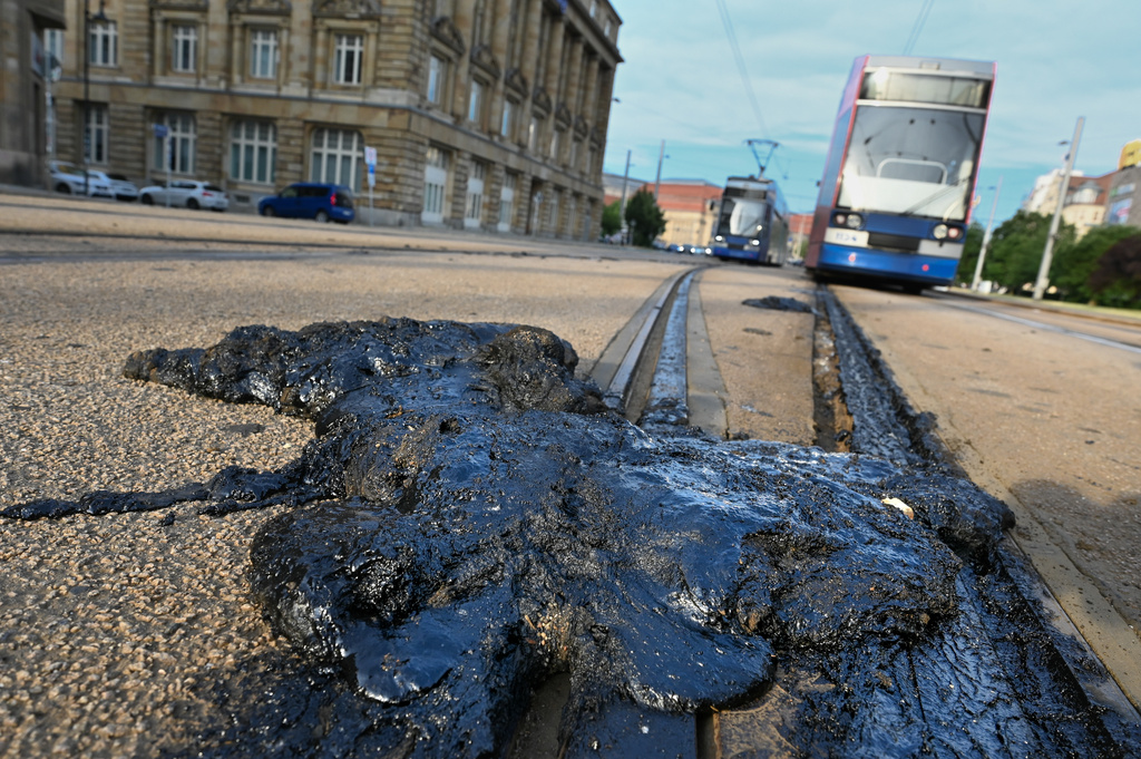 A prolonged heat wave with high temperatures exceeding caused significant damage to the tram infrastructure in Leipzigv Germany on Saturday, June 27, 2026. (Heiko Rebsch/dpa via AP)