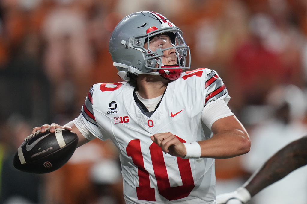 Ohio State quarterback Julian Sayin (10) throws against Texas during the first half of an NCAA college football game in Austin, Texas, Saturday, Sept. 12, 2026. (AP Photo/Eric Gay)