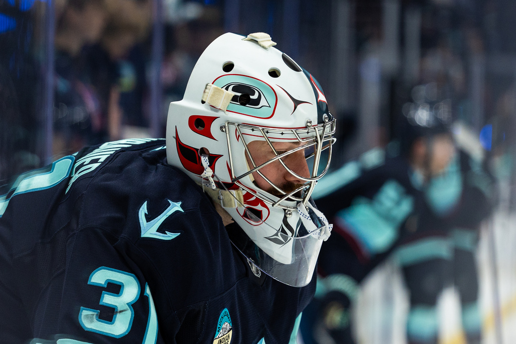 Seattle Kraken goaltender Philipp Grubauer warms up before an NHL hockey game Edmonton Oilers, Saturday, Nov. 29, 2025, in Seattle. (AP Photo/Maddy Grassy)