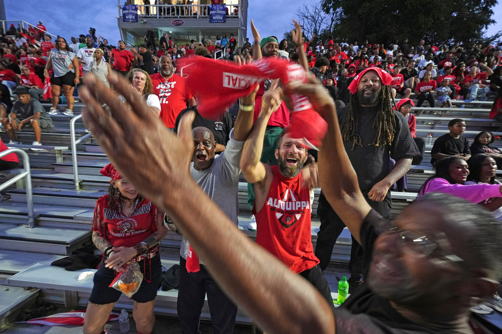 Aliquippa High School football fans celebrate after an Aliquippa touchdown during a high school football game between Aliquippa and Mars high schools at Heinz Field in Aliquippa, Pa., Friday, Sept. 4, 2026. (AP Photo/Gene J. Puskar)